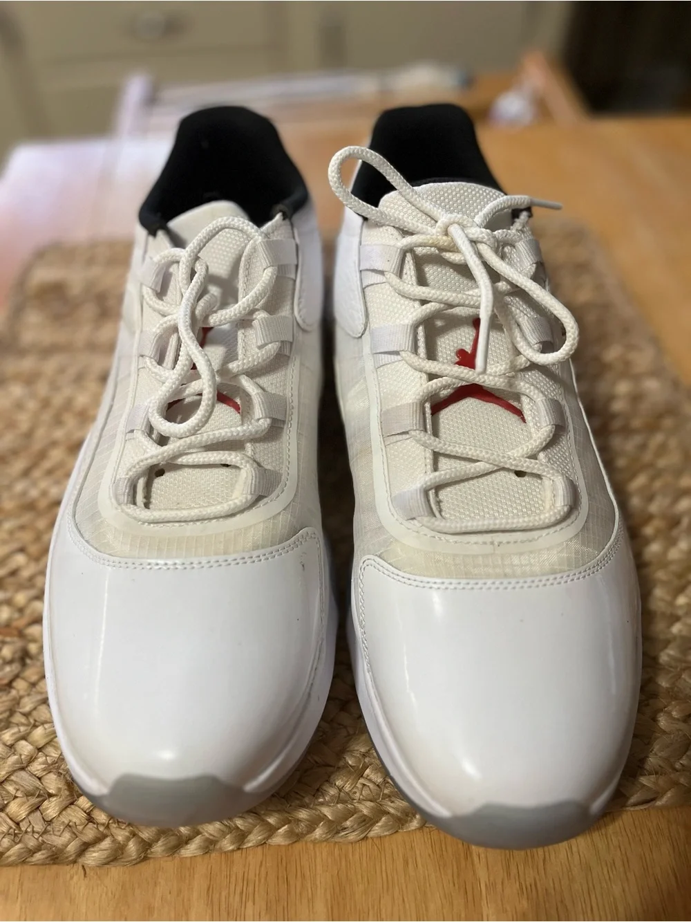 Jordan Men's White Athletic Shoes with Black Collar and Red Logo